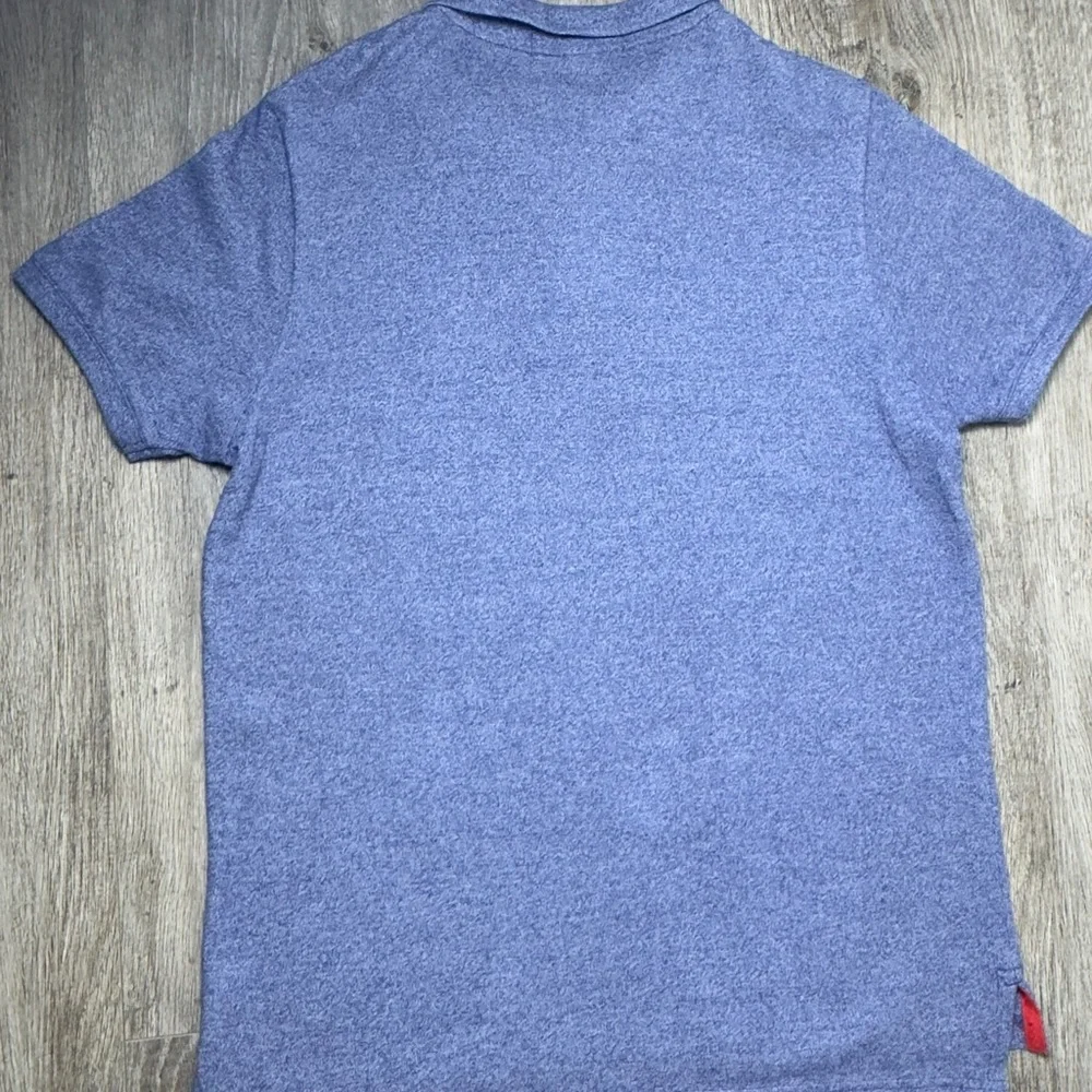 U.S. Polo Assn. Heather Blue Polo with Red Emblem - Picture 5 of 5